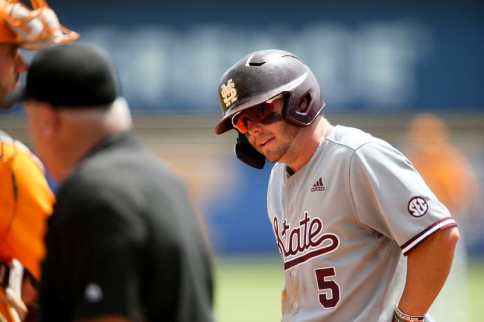 Mississippi State's Tanner Allen (5) takes an extra few minutes to recover after fouling a ball off his foot on Thursday. MSU went on to lose 12-2 to Tennessee as the Bulldogs were eliminated from the SEC Baseball Tournament. (Photo by Gary Cosby Jr.)